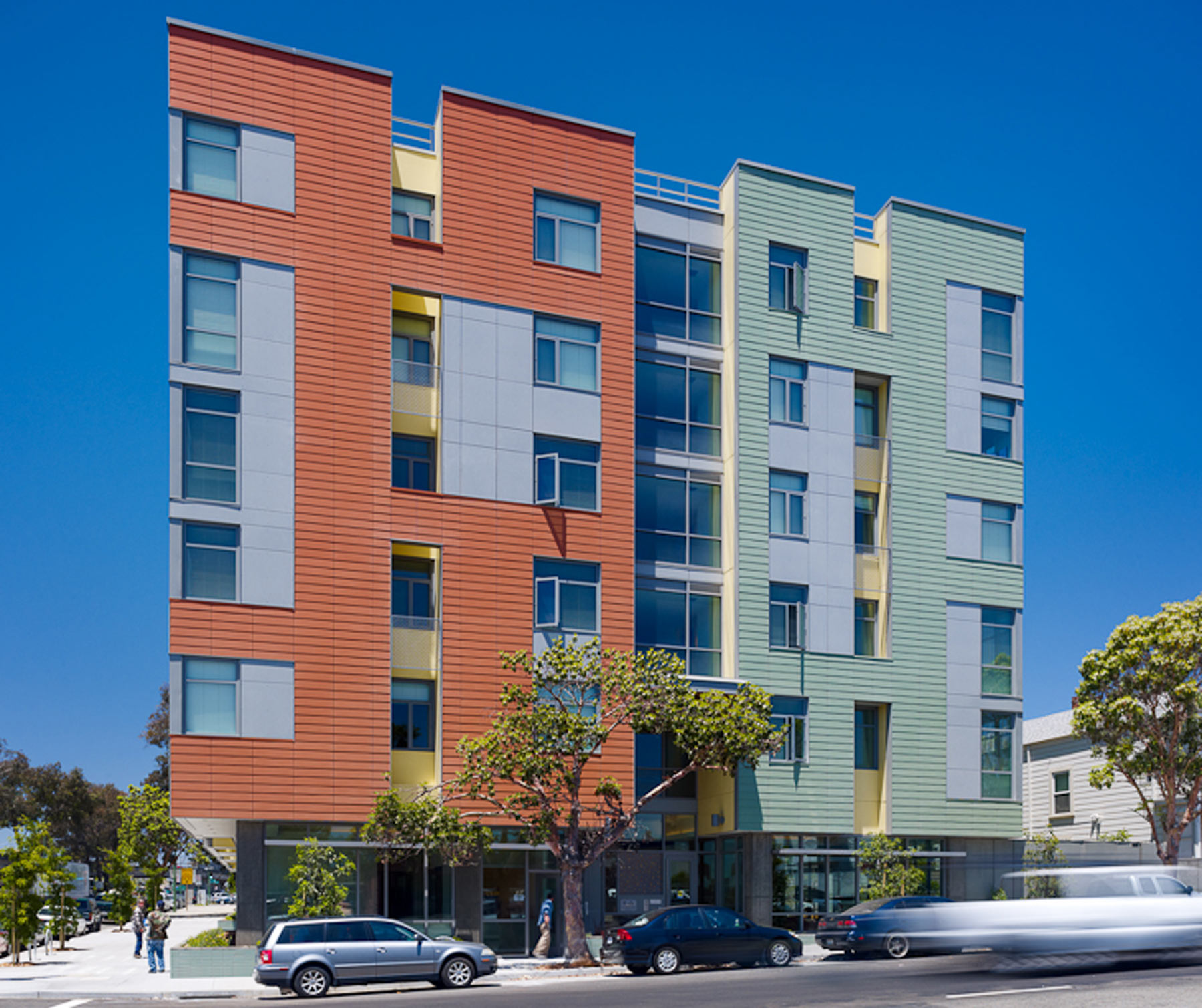 Merritt Crossing is a Green Point rated and LEED Platinum certified affordable housing building for seniors, a model of sustainable design in an urban area of Oakland in the Bay Area.