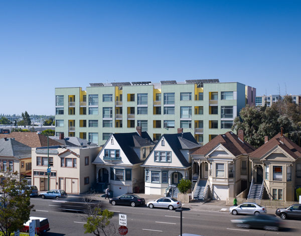 Merritt Crossing is a Green Point rated and LEED Platinum certified affordable housing building for seniors, a model of sustainable design in an urban area of Oakland in the Bay Area.